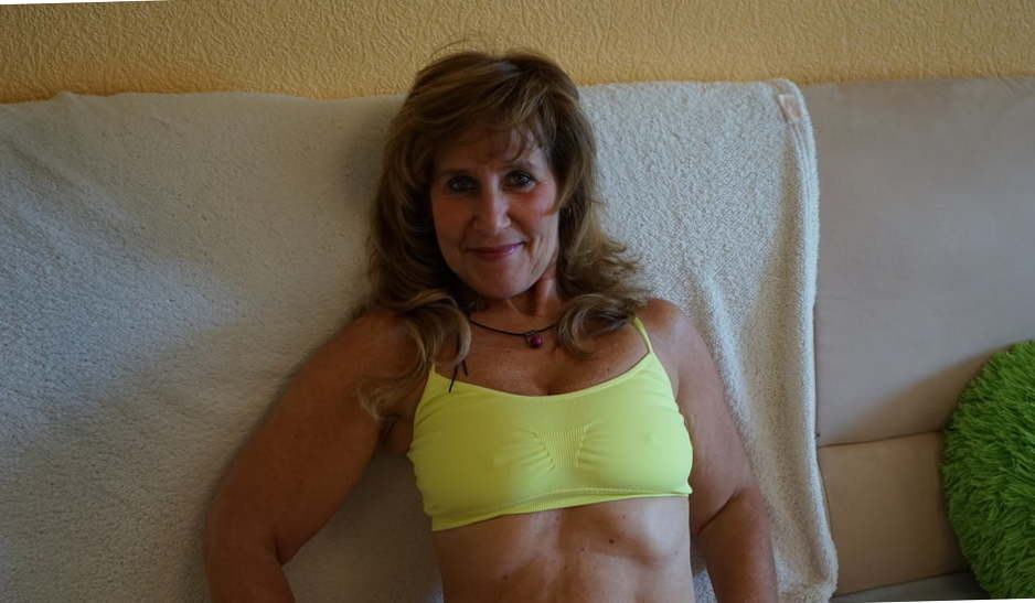 Young-looking gilf puts on hot underwear